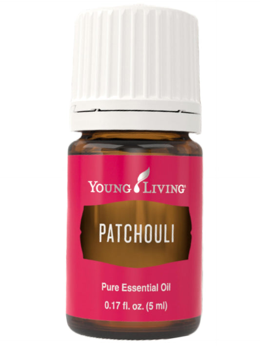 Young Living Patchouli essential oil bottle, earthy aroma for grounding calm and focus.