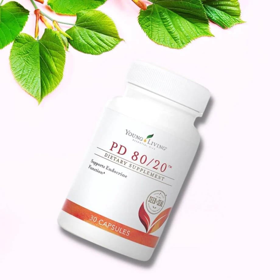 Young Living PD80-20 dosing guide beside the bottle.