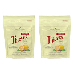 Young Living Thieves Hard Lozenges packaging on a desk for on-the-go use
