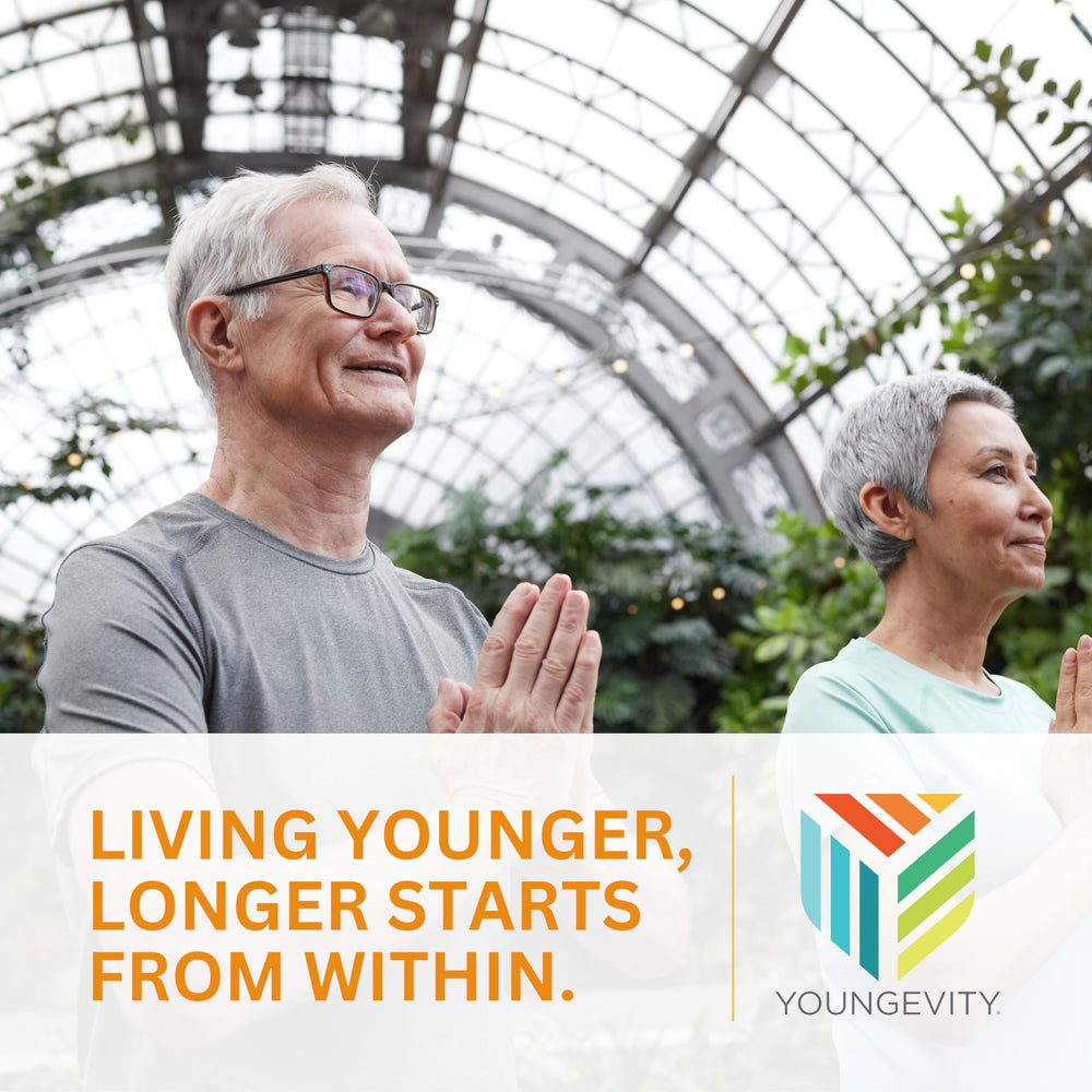 Youngevity Beyond Tangy Tangerine 2.0 bottle with glass ready to enjoy daily nutrition.