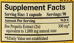 Close-up of YS Eco Bee Farms Propolis Raw 1000mg capsules highlighting bioflavonoids