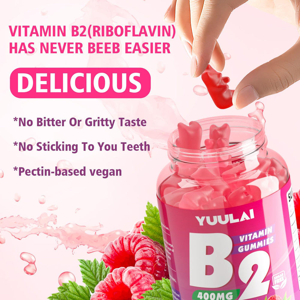 YUULAI B2 gummies texture close-up shows chewy bite and raspberry taste.