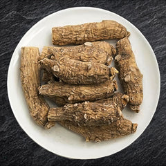 Zen Ginseng AAA-grade American Wisconsin ginseng closeup, highlighting quality roots.