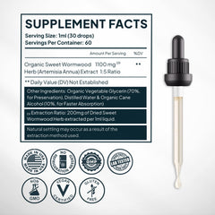Zenmen tincture being poured into a glass for mixing with water