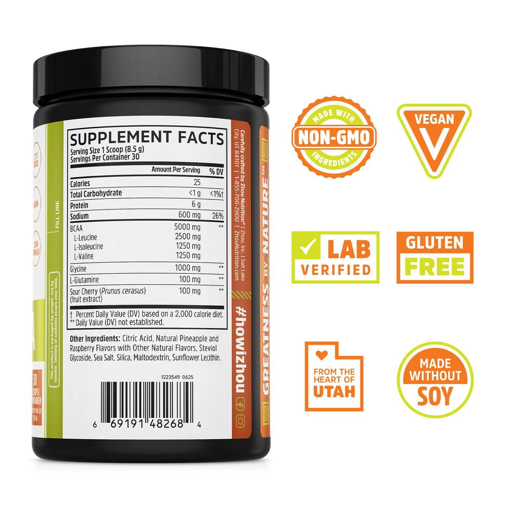 Pouring ZHOU BCAA Tropical Punch into a glass for hydration during training.