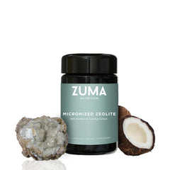 Zuma Nutrition Zeolite capsules pouring from bottle, supporting daily gut wellness.