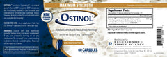 Person taking Ostinol capsules as part of daily wellness