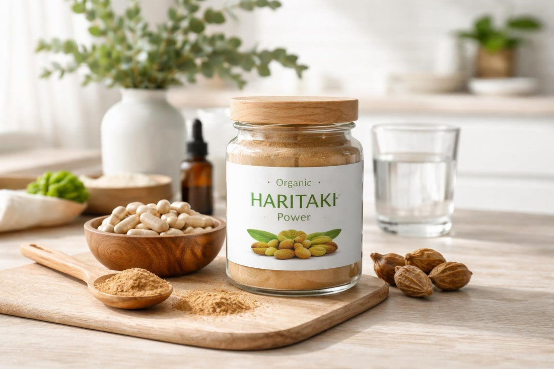 Organic haritaki powder jar with capsules on wood