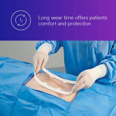 Close-up of applying 3M Tegaderm Absorbent Clear Acrylic Dressing over an incision
