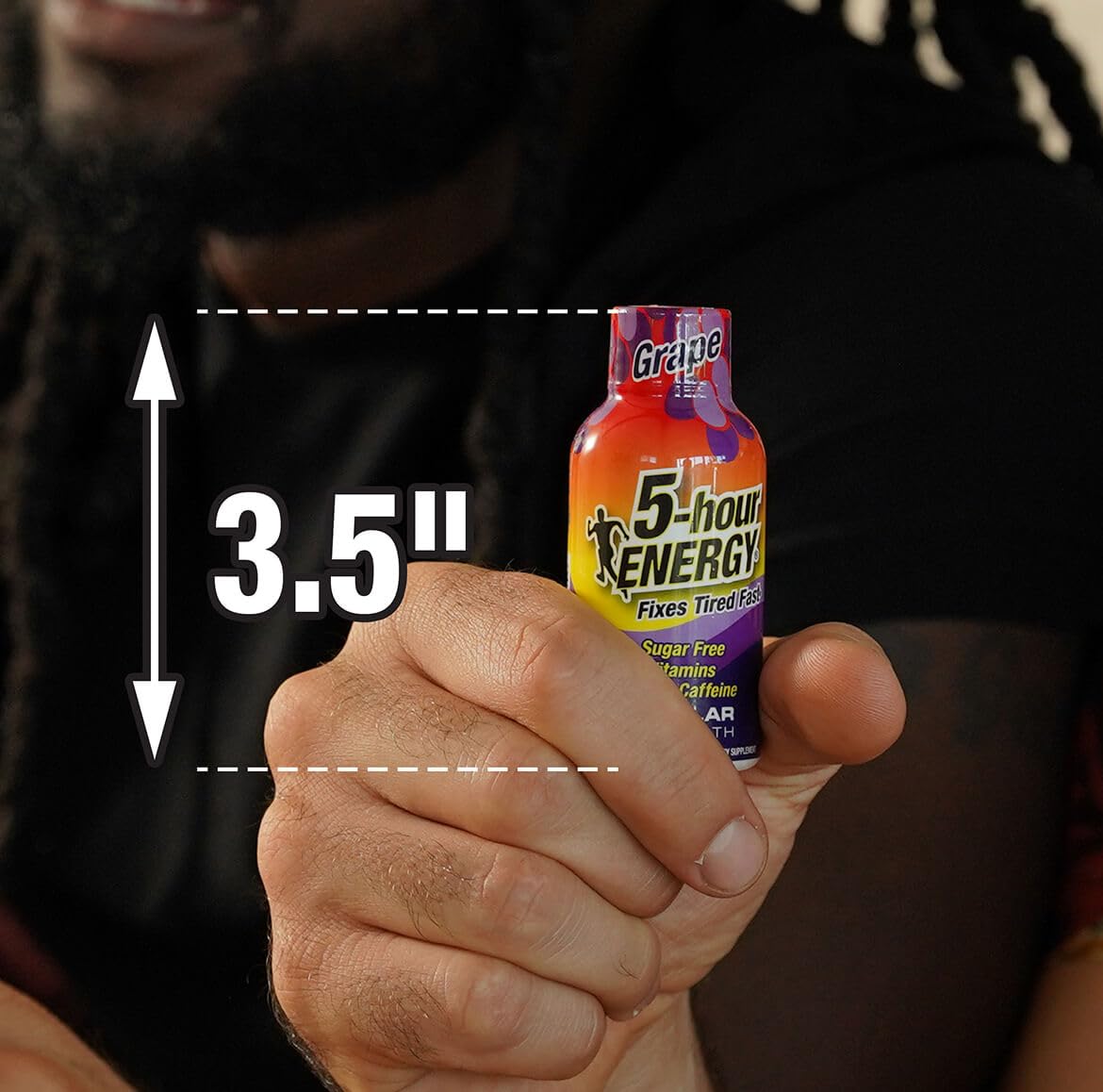 5-hour ENERGY grape shot in hand during morning routine