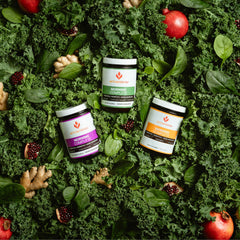 ActivatedYOU Morning Complete greens blend powder with fresh produce backdrop