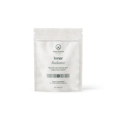 Adapt Naturals Inner Radiance bottle pour showing daily dosage for skin and hair support