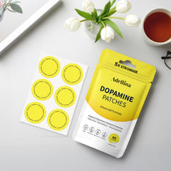 Adellina patches resting on skin with soft lighting.