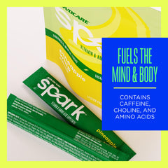 AdvoCare Spark Pineapple Whip mixed drink in a glass with vibrant flavor.