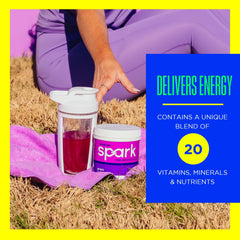 AdvoCare Spark scoop dispensing powder for quick preparation.
