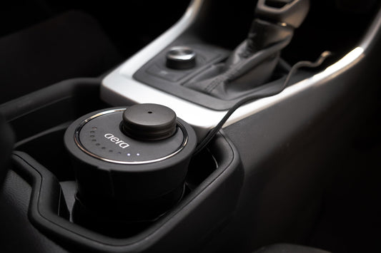 Aera Go Car Diffuser body shot showing a sleek, refined cabin scent.