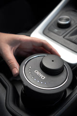 Aera Go Car Diffuser scent capsule slot illustrating fragrance options.