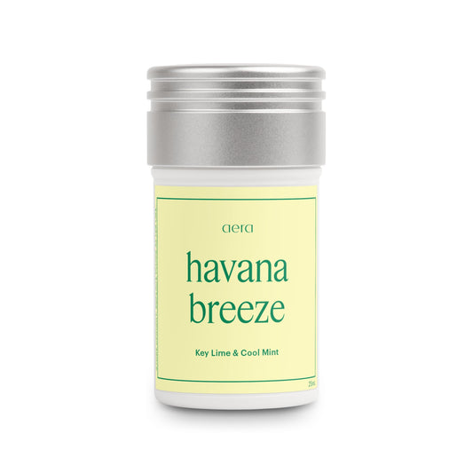 Aera Havana Breeze fragrance refill bottle releasing key lime and cool mint aroma for refreshed spaces