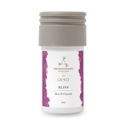 AERA Mini Bliss bottle close-up showing marjoram, ylang-ylang, valerian notes for a calm ambiance