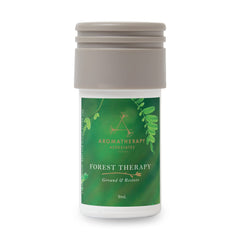 AERA Mini Forest Therapy bottle releasing pink pepper, cypress, ho wood for a calming atmosphere