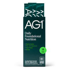 AG1 Athletic Greens powder scoop for daily gut-supporting nutrition.