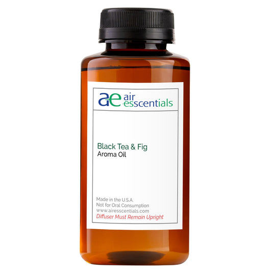 Air Esscentials Black Tea and Fig bottle for diffusers with long-lasting fragrance.