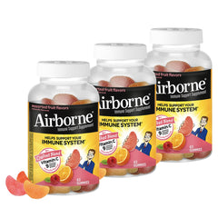Airborne 750mg Vitamin C Gummies bottle pour shows convenient daily immune support on a shelf.