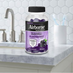 Airborne Elderberry Gummies bottle dispense shows easy dosing.