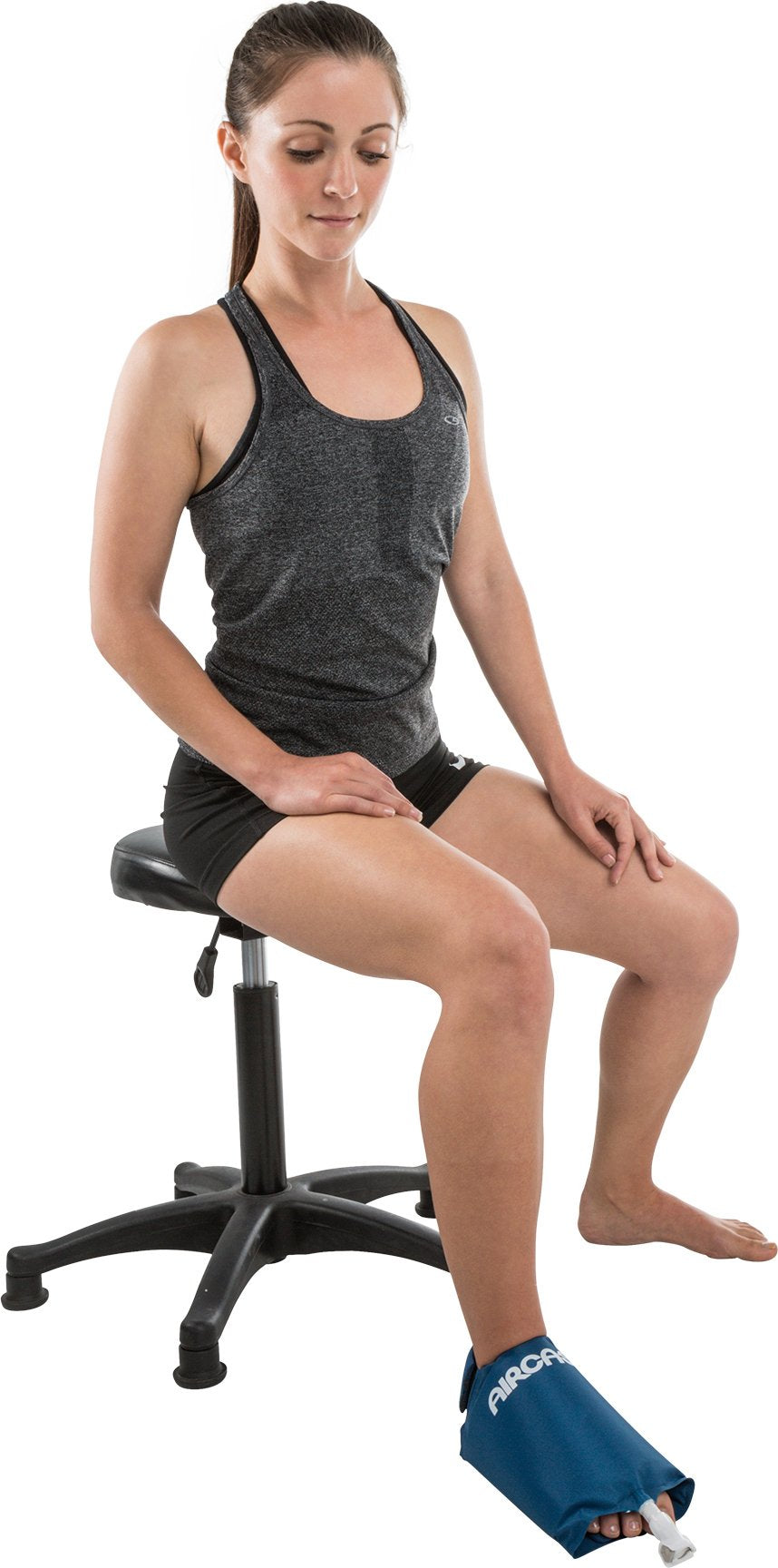 Aircast Foot Cryo/Cuff worn on foot during recovery sessions.