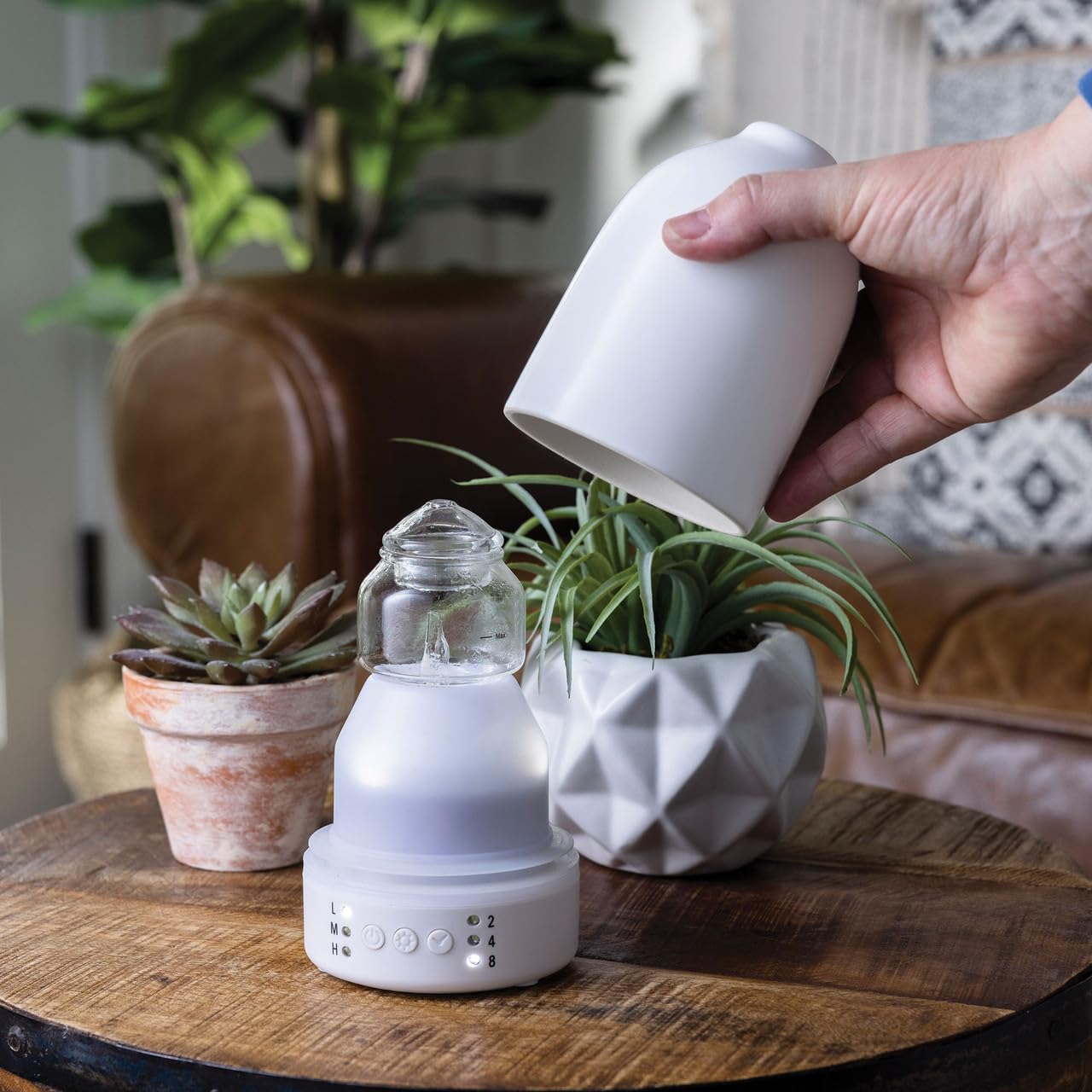 Airome Snow Diffuser modern design complements any room decor.