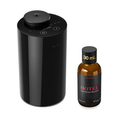 Airversa AN6Kit-4 black diffuser on a desk delivering lasting fragrance