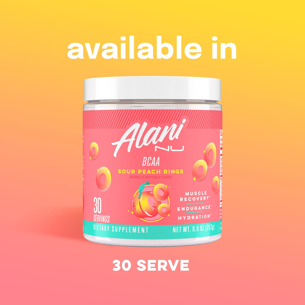 Alani Nu BCAA Sour Peach Ring ready in a glass after mixing
