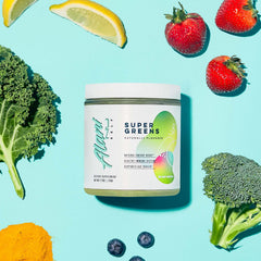 Alani Nu Super Greens packaging on display, gluten-free and vegan formula.