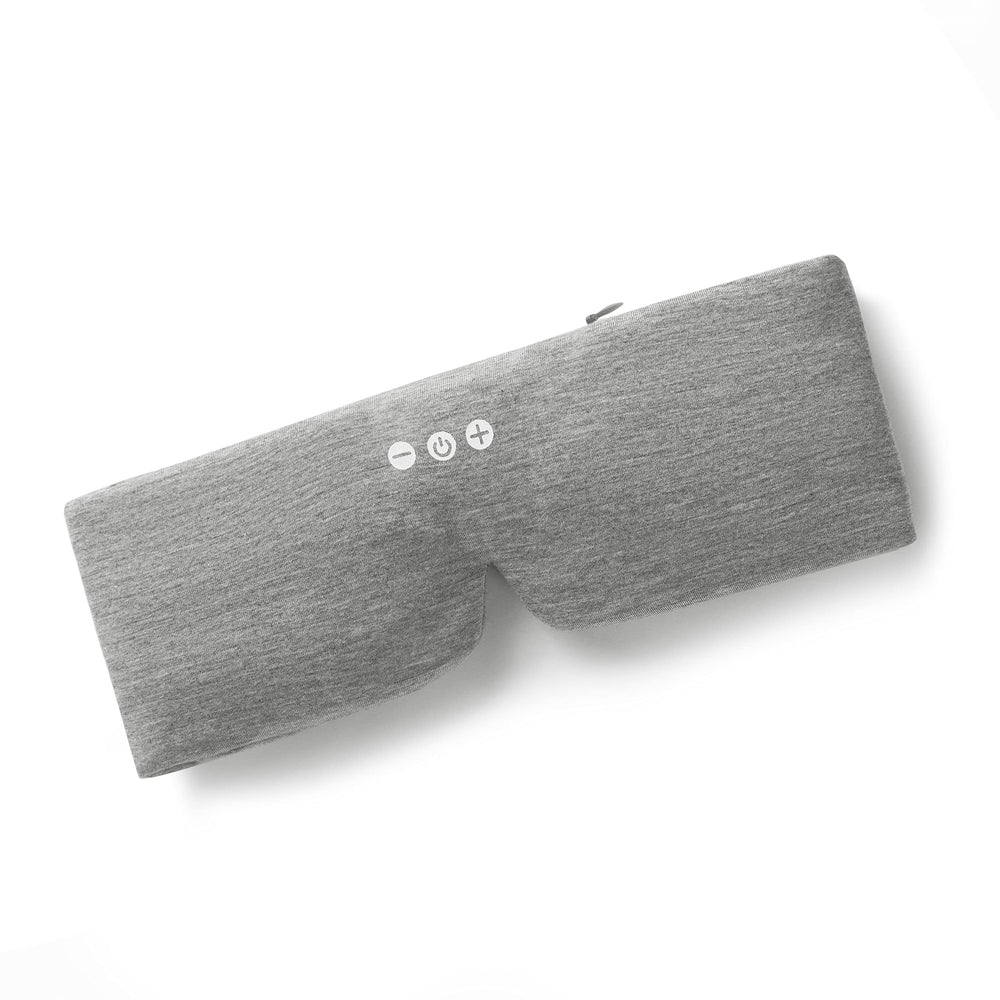 ALASKA BEAR Sleep Headphone Mask on face for comfortable sleep with built-in speakers.