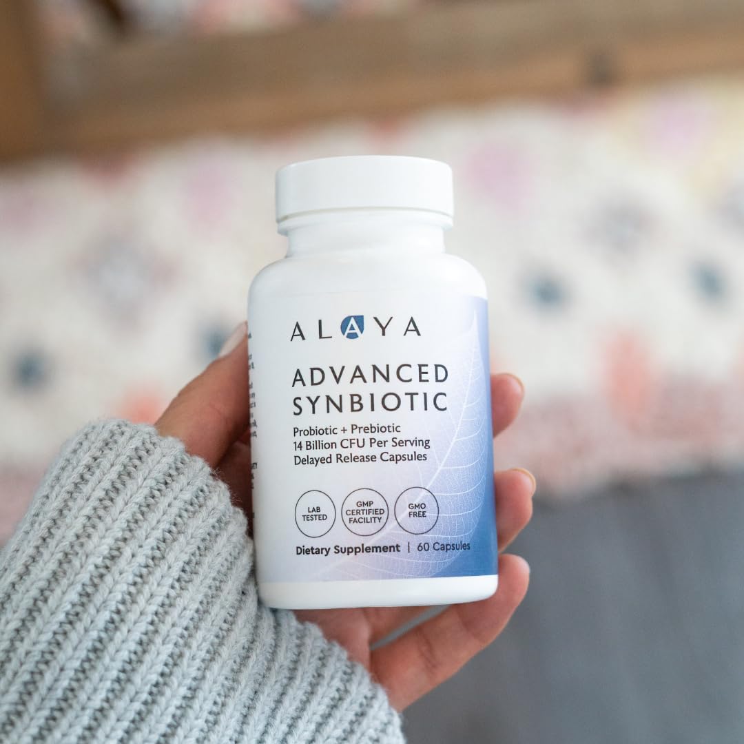 Alaya Naturals Advanced Synbiotic with glass of water for daily routine.