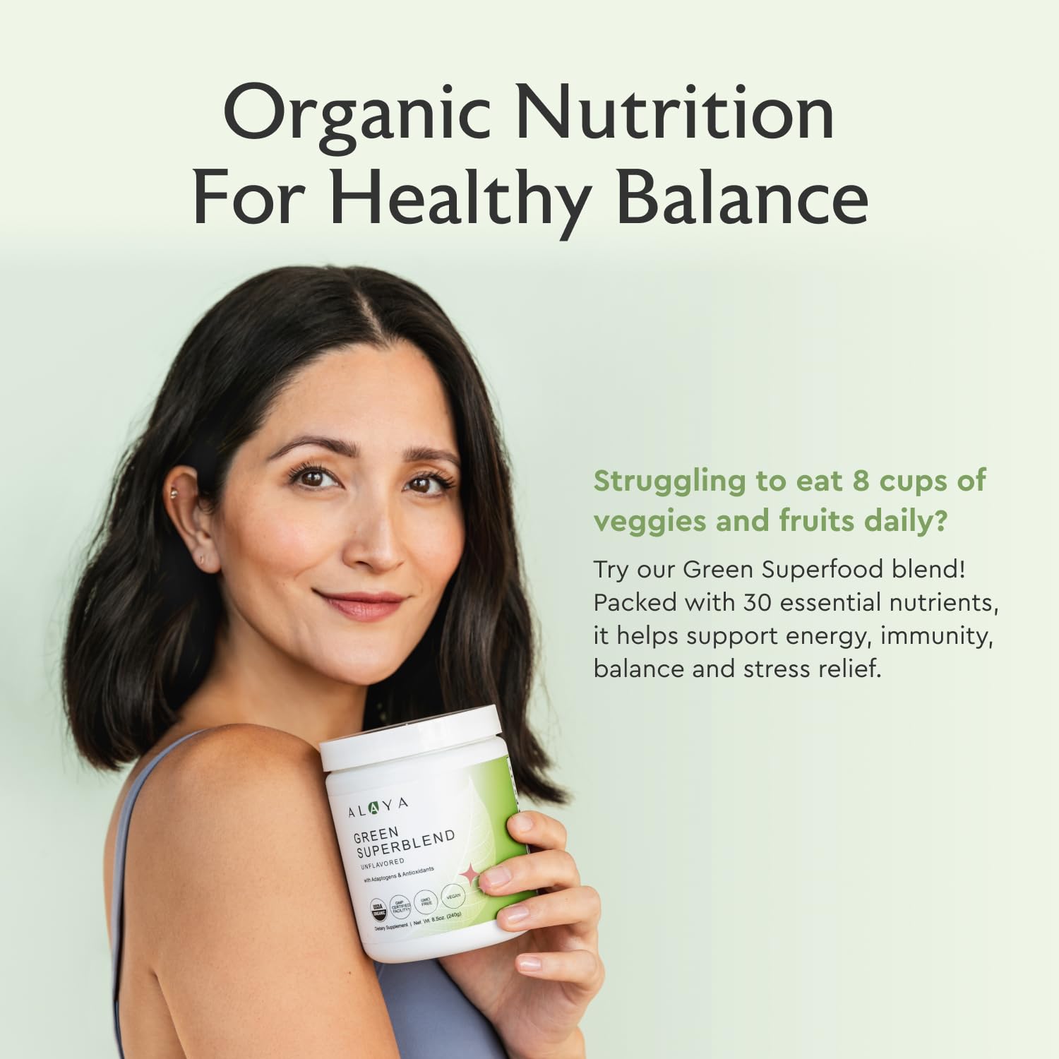 Alaya Naturals Organic Super Greens Powder glass with dust, inviting color and texture.