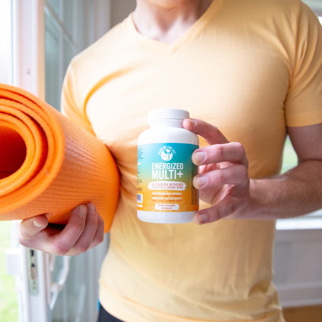 Alkaline for Life Energized Multi in a bottle with glass for daily wellness routine