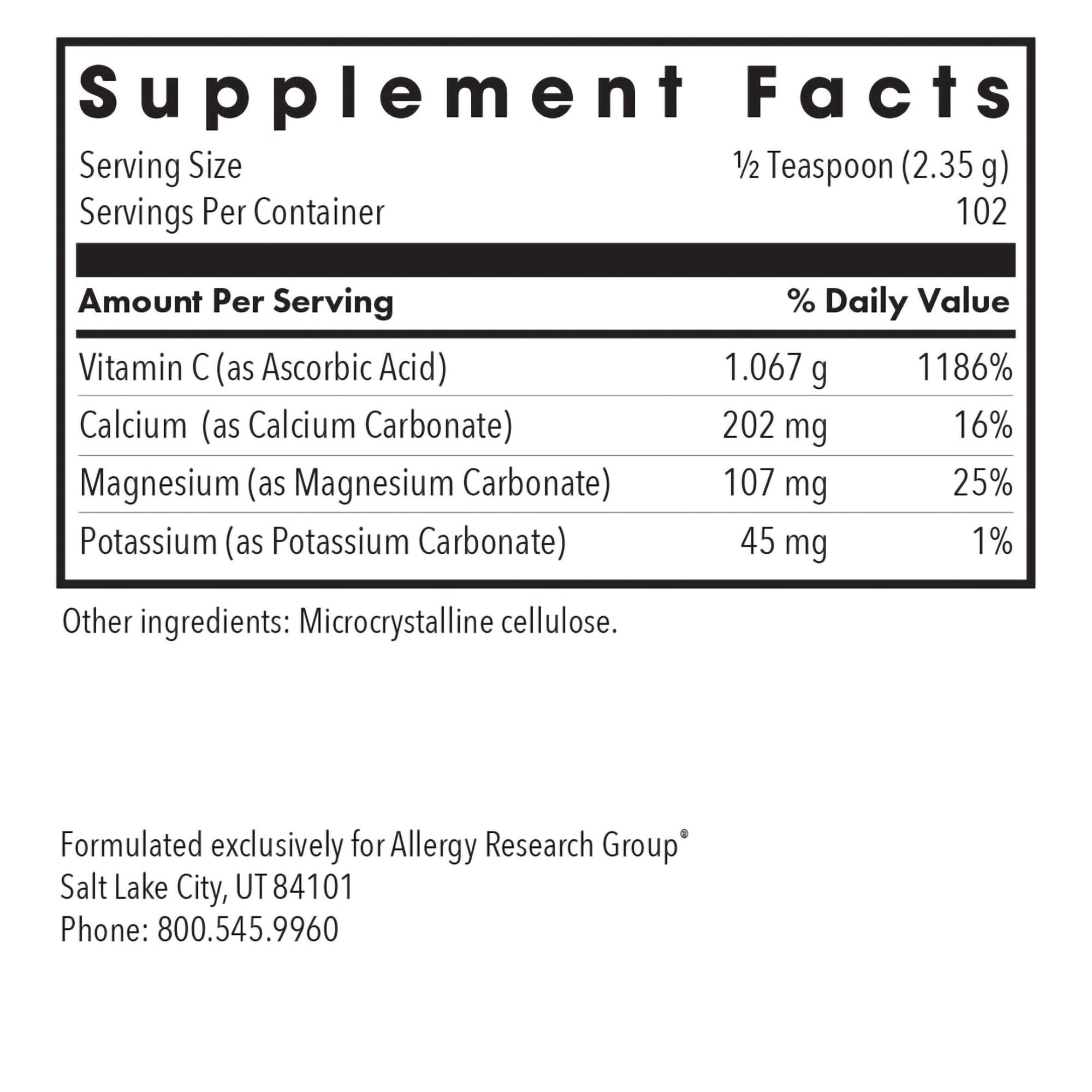 Scoop dispensing a measured serving of Allergy Research Group Buffered Vitamin C Powder