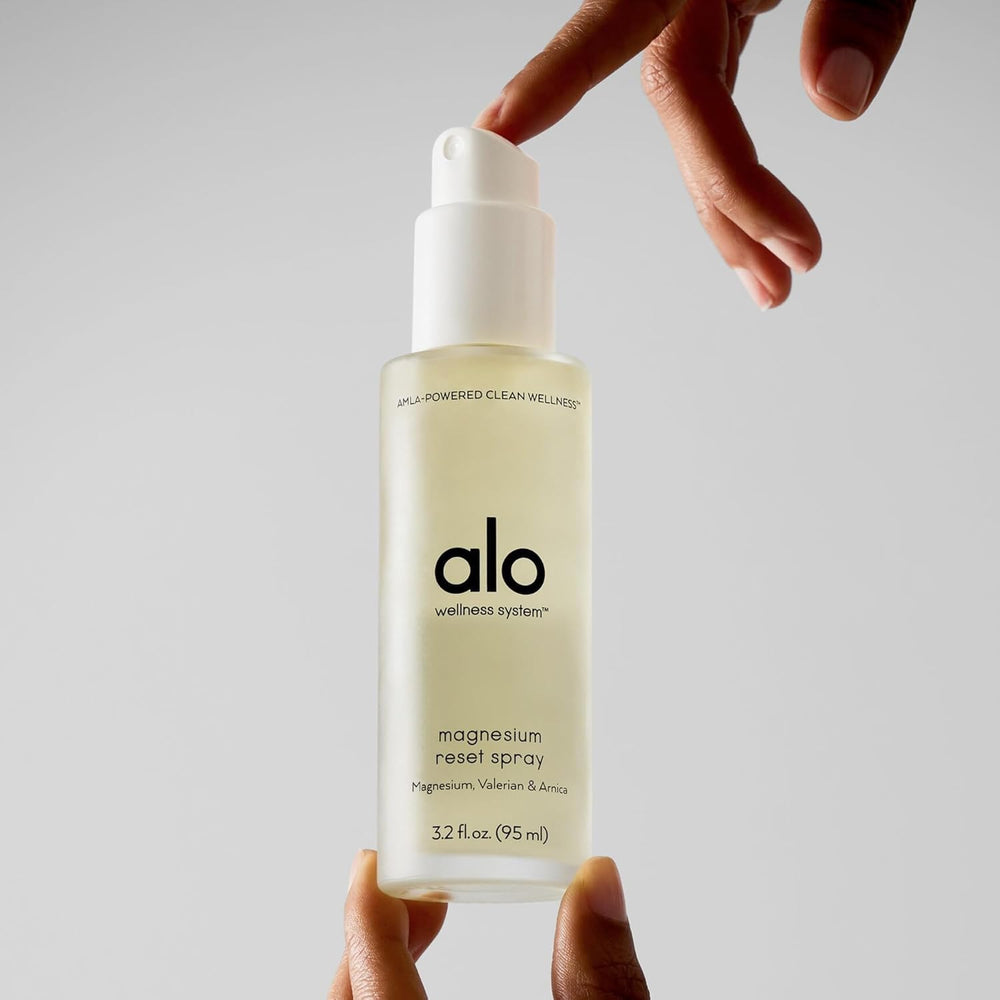 Alo Magnesium Reset mini bottle shown as travel-friendly option for on-the-go relaxation.