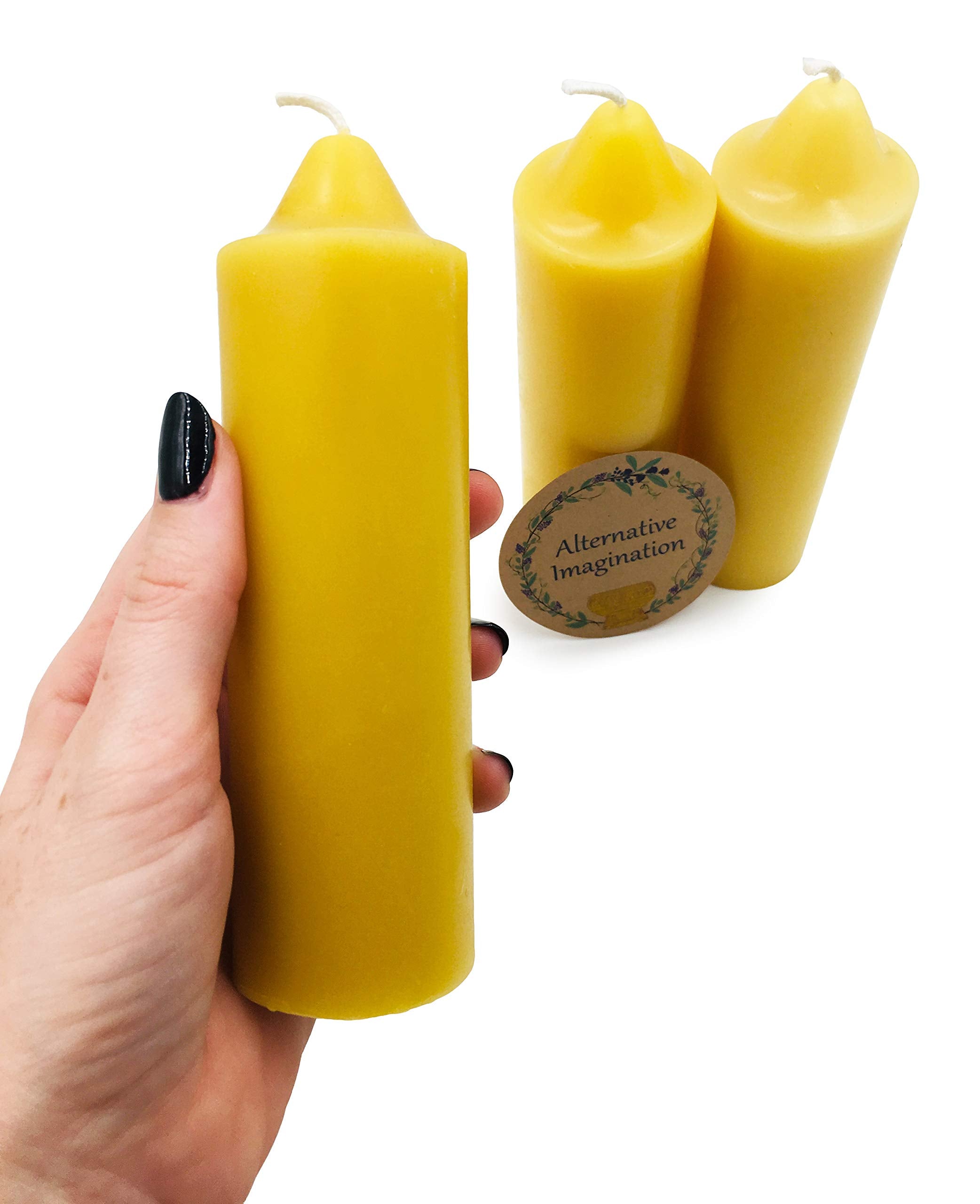 Alternative Imagination three-pack beeswax candles for long-lasting ambient light.