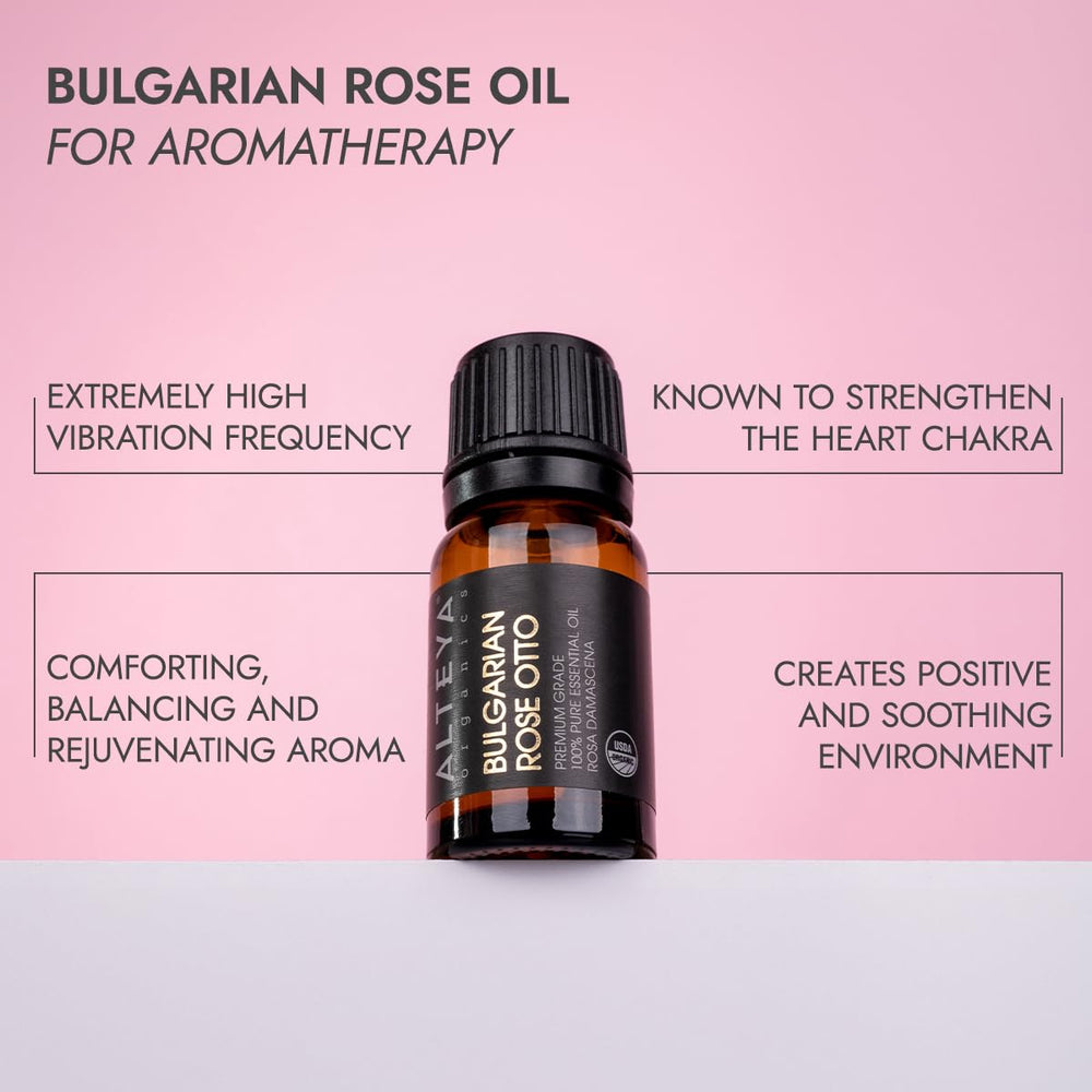 Alteya Organics Rose Essential Oil in a diffuser with petals for calming ambience.