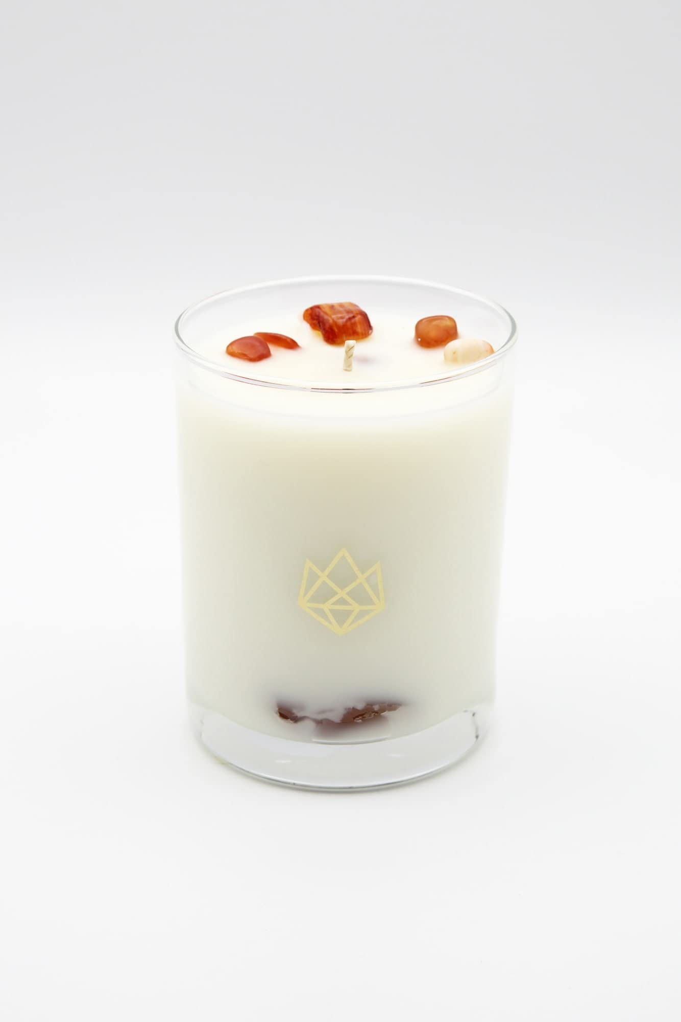 Aluminate Life red carnelian crystal-infused candle for focus and motivation.