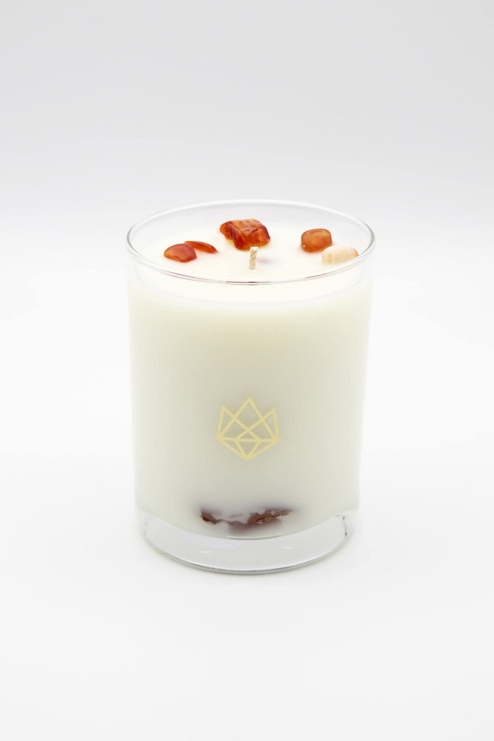 Aluminate Life red carnelian crystal-infused candle for focus and motivation.