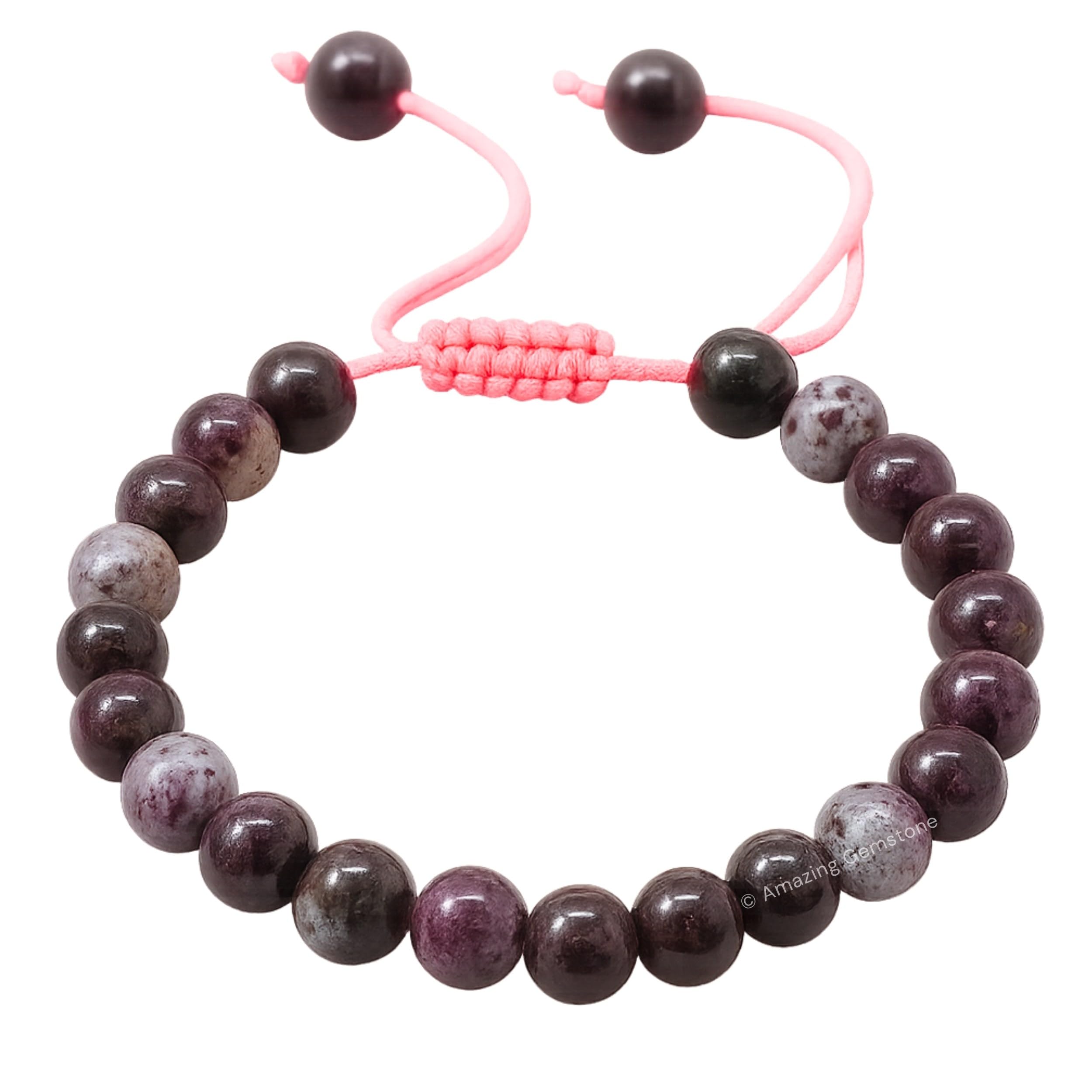 Amazing Gemstone Eudialyte bracelet close-up shows smooth beads with subtle shimmer.
