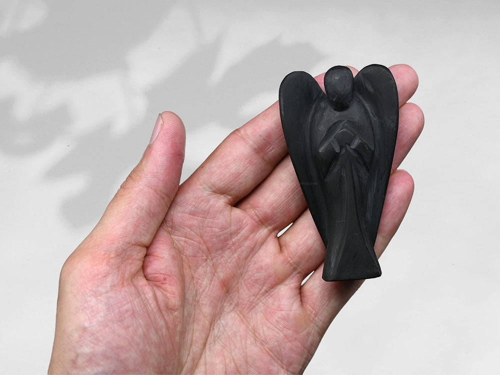 Amazing Gemstone Shungite Angel adds serene decor and comforting symbolism at home.