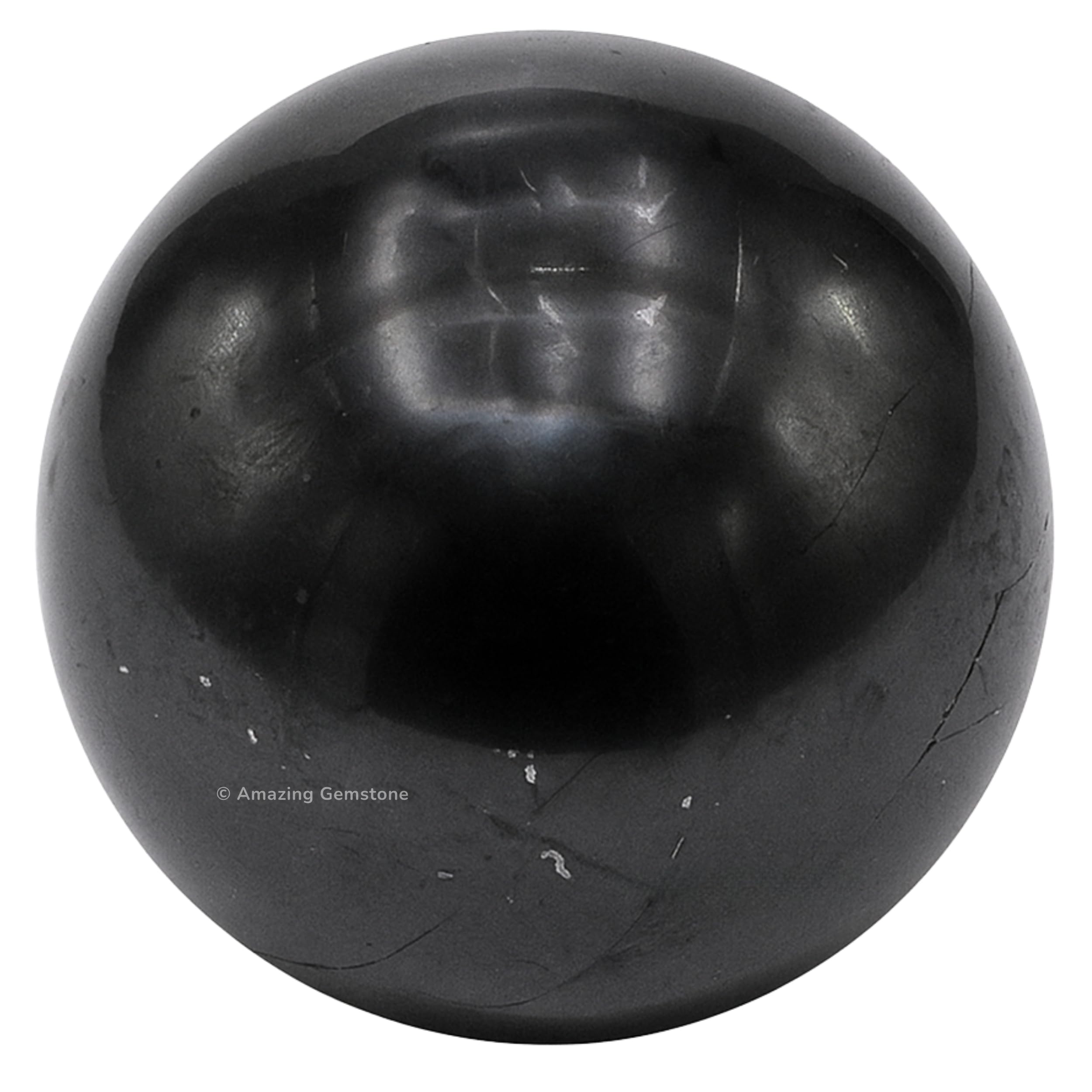 Closeup of Amazing Gemstone Shungite ball highlighting natural texture.