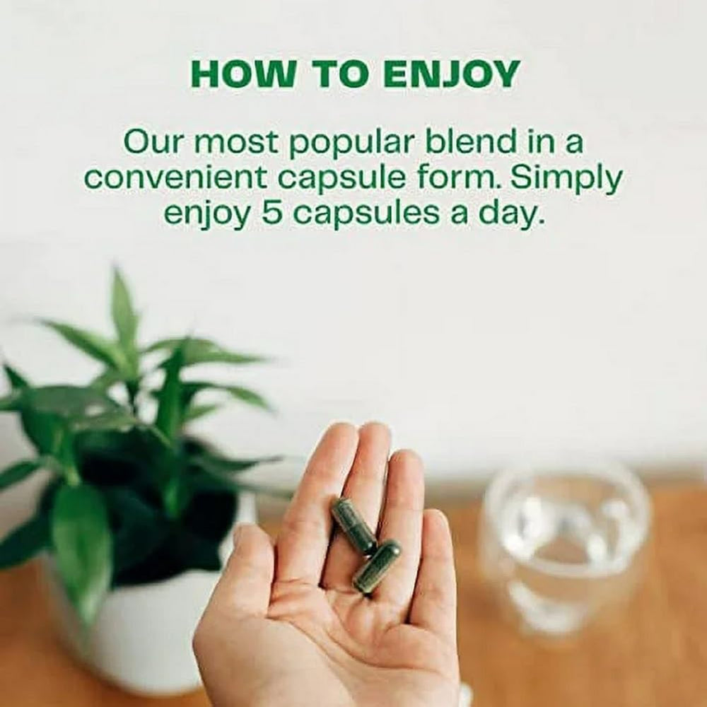 Amazing Grass Greens Blend bottle with a scoop suggests simple mixing.