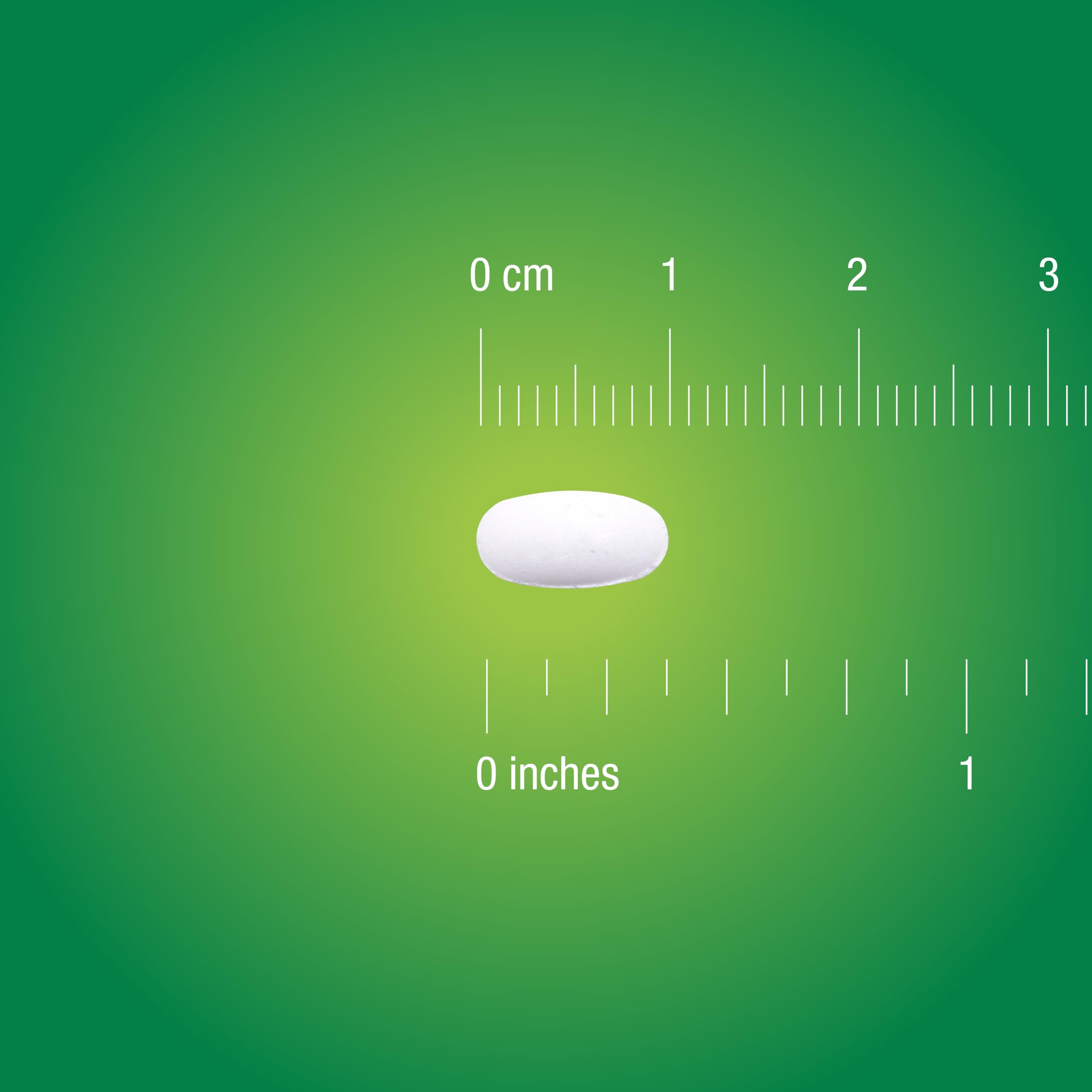 Lozenge tablet close-up showing mint flavor.