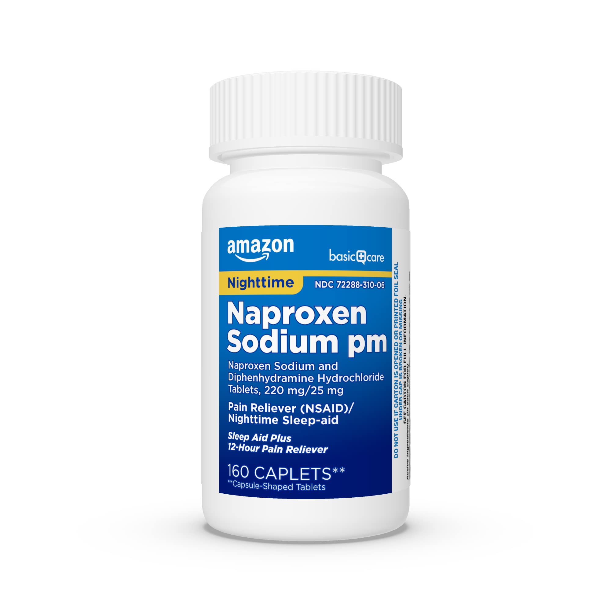 Amazon Basic Care PM tablets beside nightstand for nightly routine
