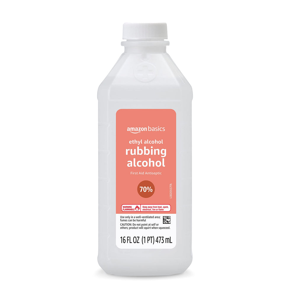 Amazon Basics 70% rubbing alcohol bottle pouring for quick surface cleaning